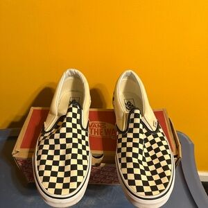 Vans Black and White Checkerboard Slip-Ons